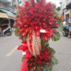 hoa chuc mung khai truong mau do